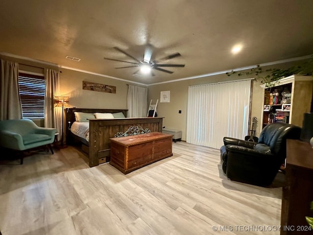 bedroom with ceiling fan, light hardwood / wood-style flooring, and crown molding