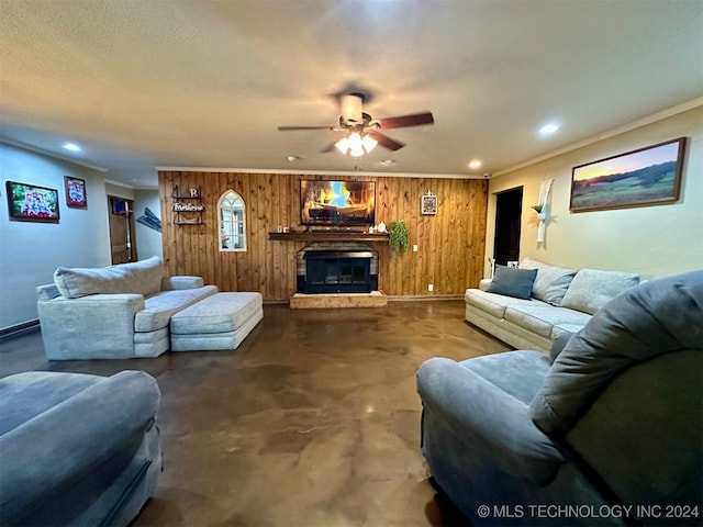 living room with ceiling fan and wooden walls