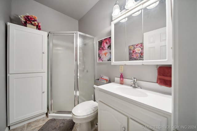 bathroom with vanity, toilet, and walk in shower