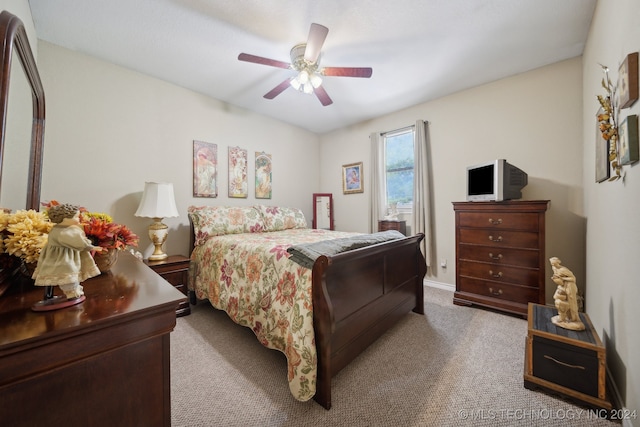 bedroom with light colored carpet and ceiling fan