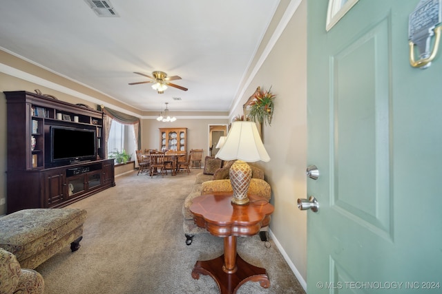 carpeted living room with ornamental molding and ceiling fan with notable chandelier