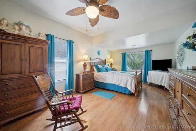 bedroom featuring ceiling fan and light wood-type flooring