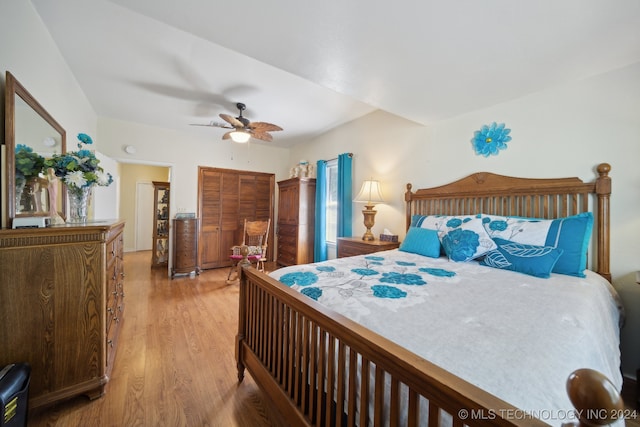 bedroom featuring wood-type flooring and ceiling fan