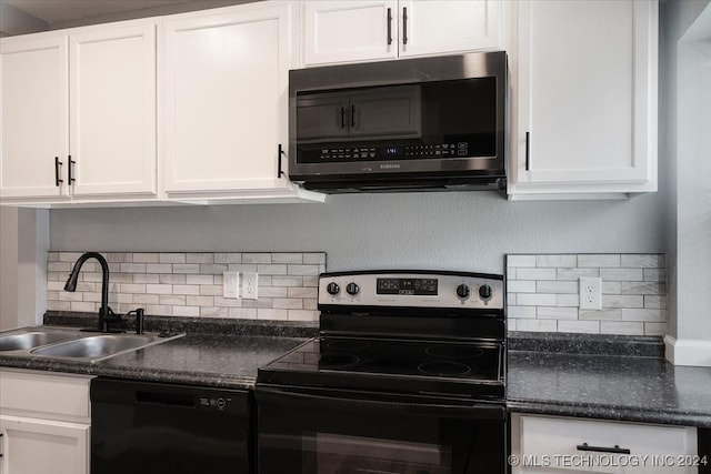 kitchen featuring sink, stainless steel appliances, white cabinetry, and backsplash