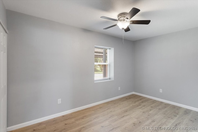 unfurnished room featuring ceiling fan and light hardwood / wood-style flooring