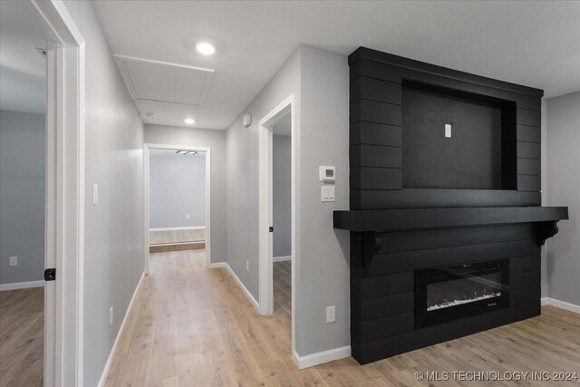701 W Alabama, Durant, OK 74701 - corridor featuring baseboards, wood finished floors, and recessed lighting