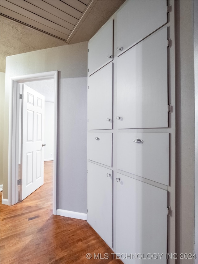 hallway featuring light hardwood / wood-style flooring