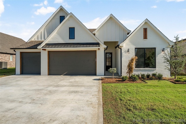 modern farmhouse featuring a front lawn and central AC unit