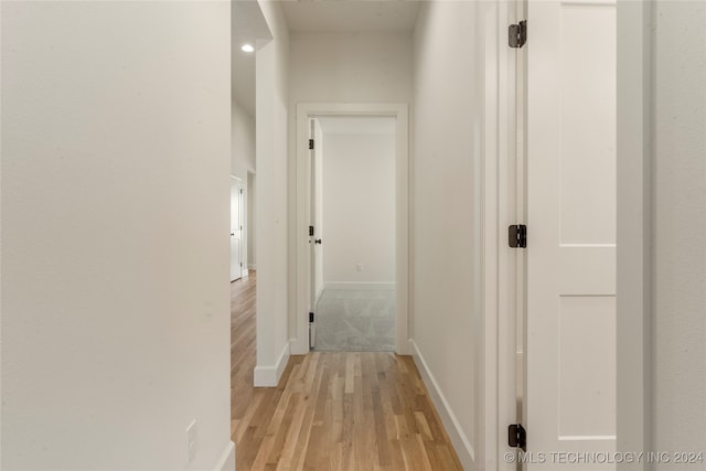 corridor featuring light wood-type flooring