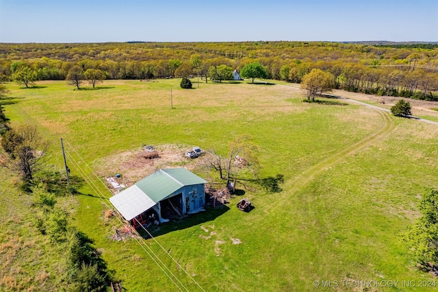 birds eye view of property featuring a rural view