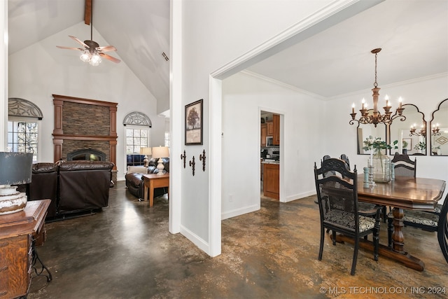 dining area with beam ceiling, high vaulted ceiling, a fireplace, ceiling fan with notable chandelier, and ornamental molding