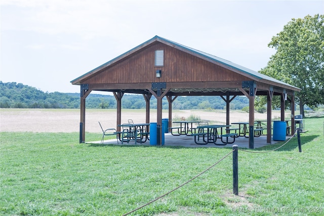 view of home's community with a yard and a gazebo