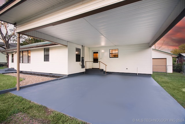 view of patio featuring a garage