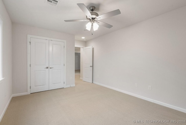 5424 E 125th Pl S, Bixby, OK 74008 - unfurnished bedroom featuring baseboards, light colored carpet, a closet, and a ceiling fan
