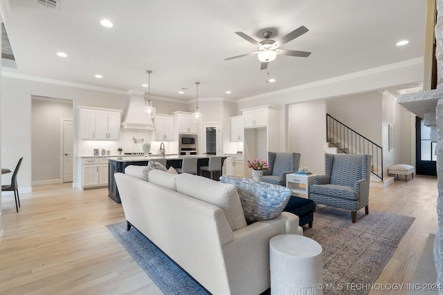 5424 E 125th Pl S, Bixby, OK 74008 - living room with ceiling fan, stairs, light wood-style floors, recessed lighting, and baseboards