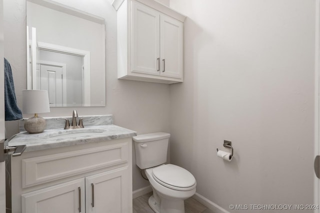 5424 E 125th Pl S, Bixby, OK 74008 - half bathroom with toilet, vanity, and baseboards