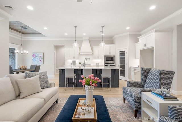 5424 E 125th Pl S, Bixby, OK 74008 - living area featuring recessed lighting, a chandelier, baseboards, light wood finished floors, and a ceiling fan