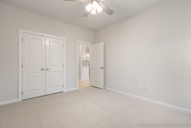 5424 E 125th Pl S, Bixby, OK 74008 - unfurnished bedroom featuring light carpet, baseboards, a closet, and a ceiling fan