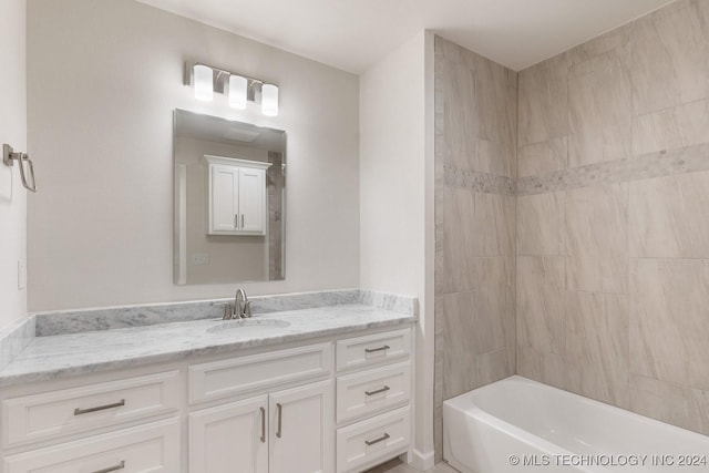 5424 E 125th Pl S, Bixby, OK 74008 - bathroom featuring vanity and washtub / shower combination