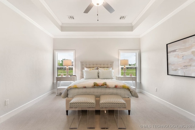 bedroom featuring ceiling fan, carpet flooring, and multiple windows