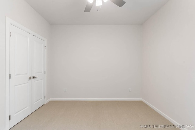 1734 W 115th Pl, Jenks, OK 74132 - unfurnished bedroom with light colored carpet, baseboards, and ceiling fan