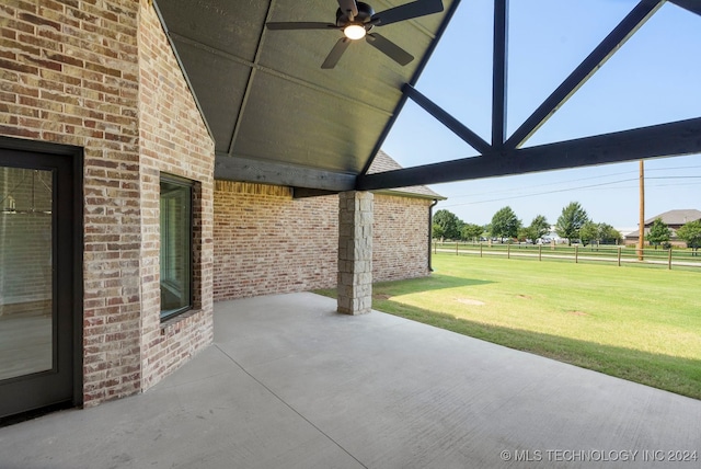 view of patio featuring ceiling fan