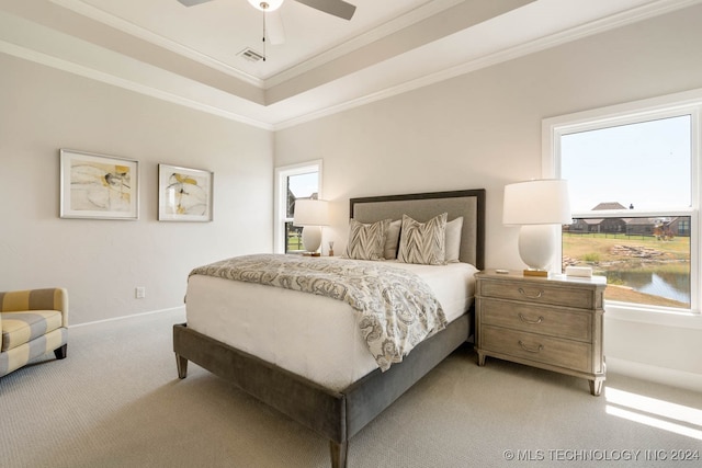 bedroom with light carpet, multiple windows, ornamental molding, and ceiling fan