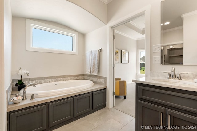 bathroom featuring ornamental molding, a tub, vanity, and a wealth of natural light