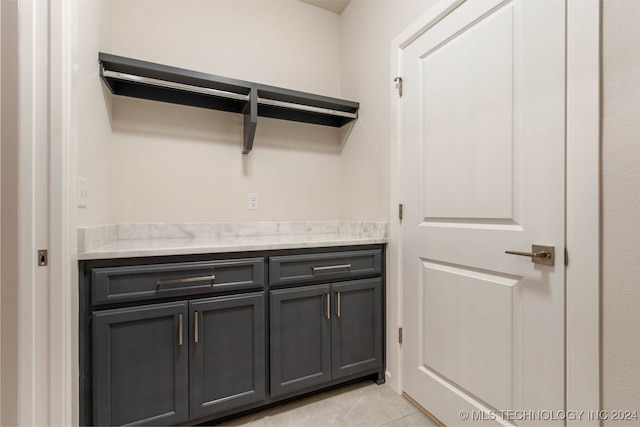 interior space with tile patterned floors