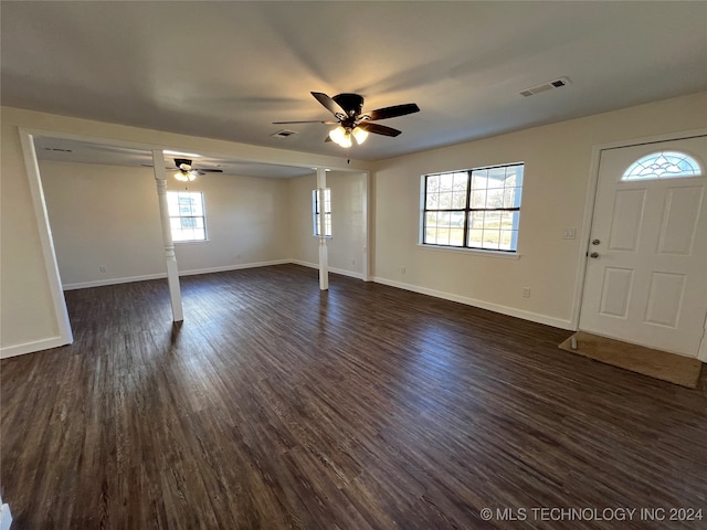 entryway with dark hardwood / wood-style flooring and ceiling fan