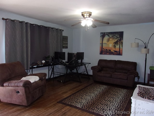 living room with hardwood / wood-style flooring and ceiling fan