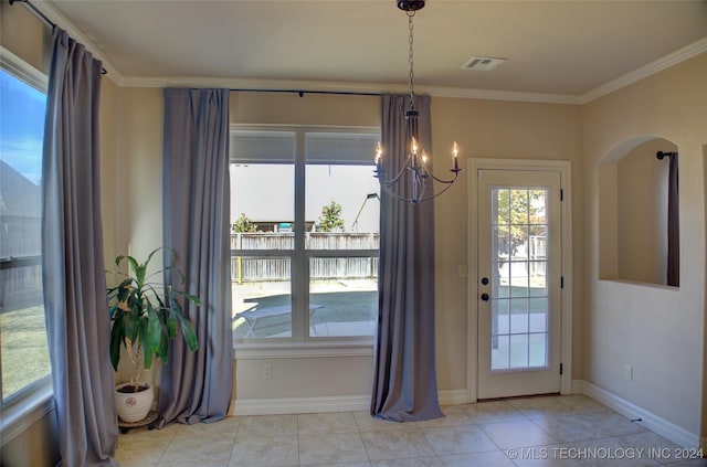 doorway to outside featuring a notable chandelier, light tile patterned flooring, and ornamental molding