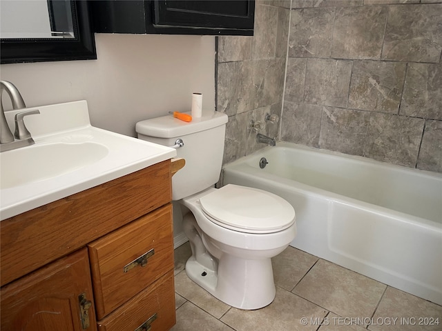 full bathroom with tiled shower / bath, vanity, tile patterned flooring, and toilet