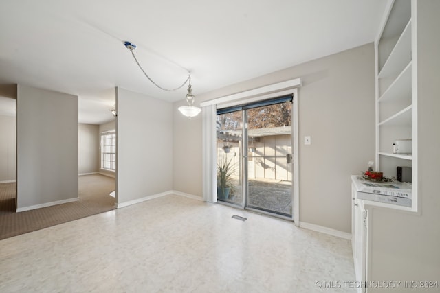 view of unfurnished dining area