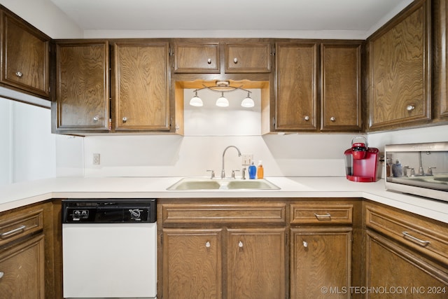 kitchen featuring dishwasher and sink