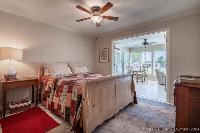 bedroom featuring ceiling fan, light carpet, a textured ceiling, and ornamental molding