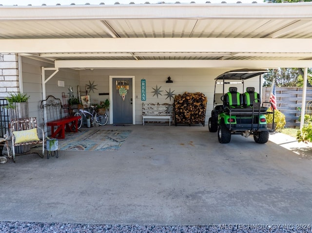 garage featuring a carport