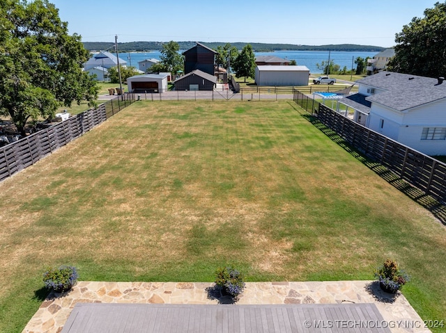 view of yard with a water view