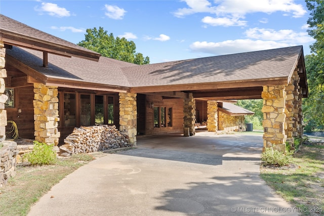 view of front of house with a carport