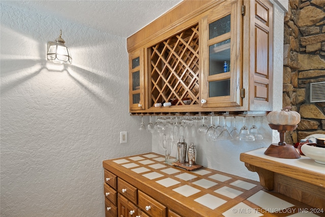 interior space with a textured ceiling