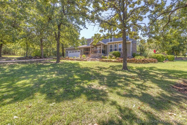 view of yard featuring a garage