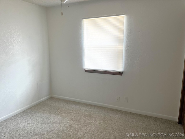 2912 Michelle, Durant, OK 74701 - carpeted spare room with baseboards