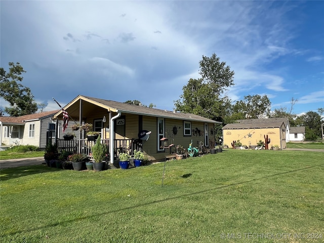 view of front of house featuring a front yard and a porch