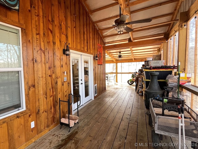 wooden deck featuring french doors and ceiling fan