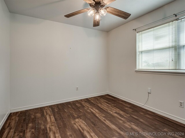 empty room featuring ceiling fan and wood-type flooring