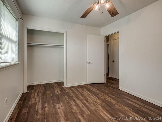 unfurnished bedroom featuring a closet, ceiling fan, and hardwood / wood-style flooring