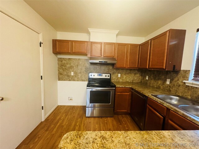 kitchen featuring backsplash, dishwasher, dark wood-type flooring, and stainless steel electric range