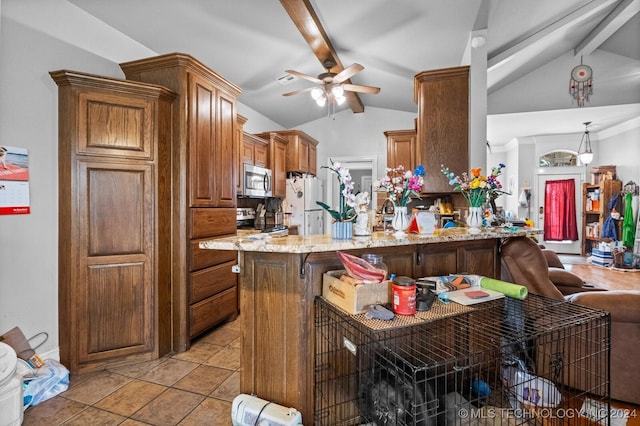 kitchen with vaulted ceiling with beams, stainless steel appliances, a peninsula, light stone countertops, and brown cabinetry