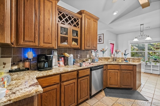 kitchen with brown cabinets, dishwasher, a peninsula, and decorative backsplash