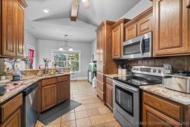 kitchen with vaulted ceiling with beams, light tile patterned floors, backsplash, appliances with stainless steel finishes, and a sink